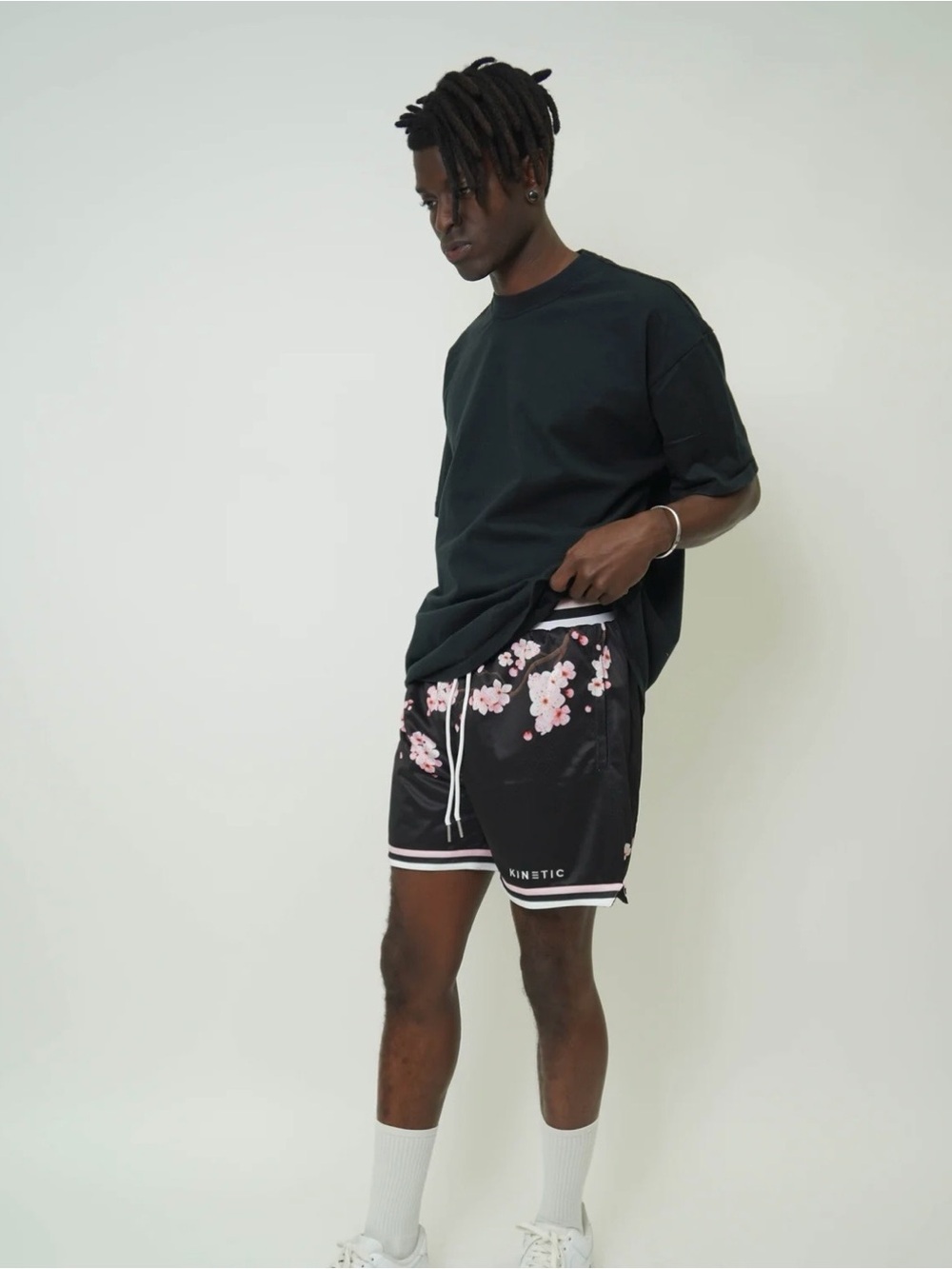 Kinetic Men's Black Athletic Shorts with Pink Floral Accents
